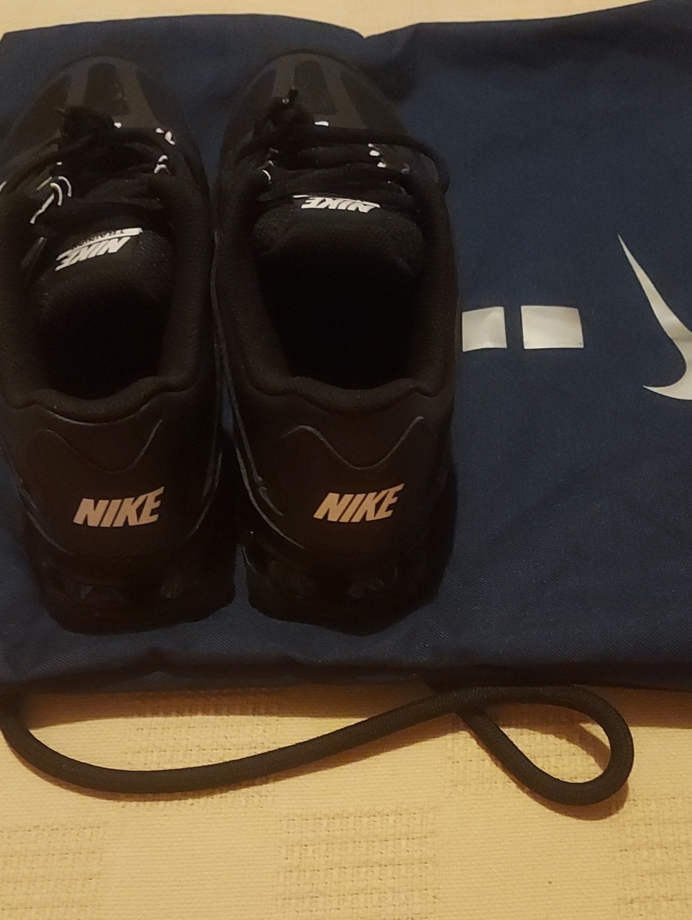 Nike Black Sneakers with Pink Heel Logo